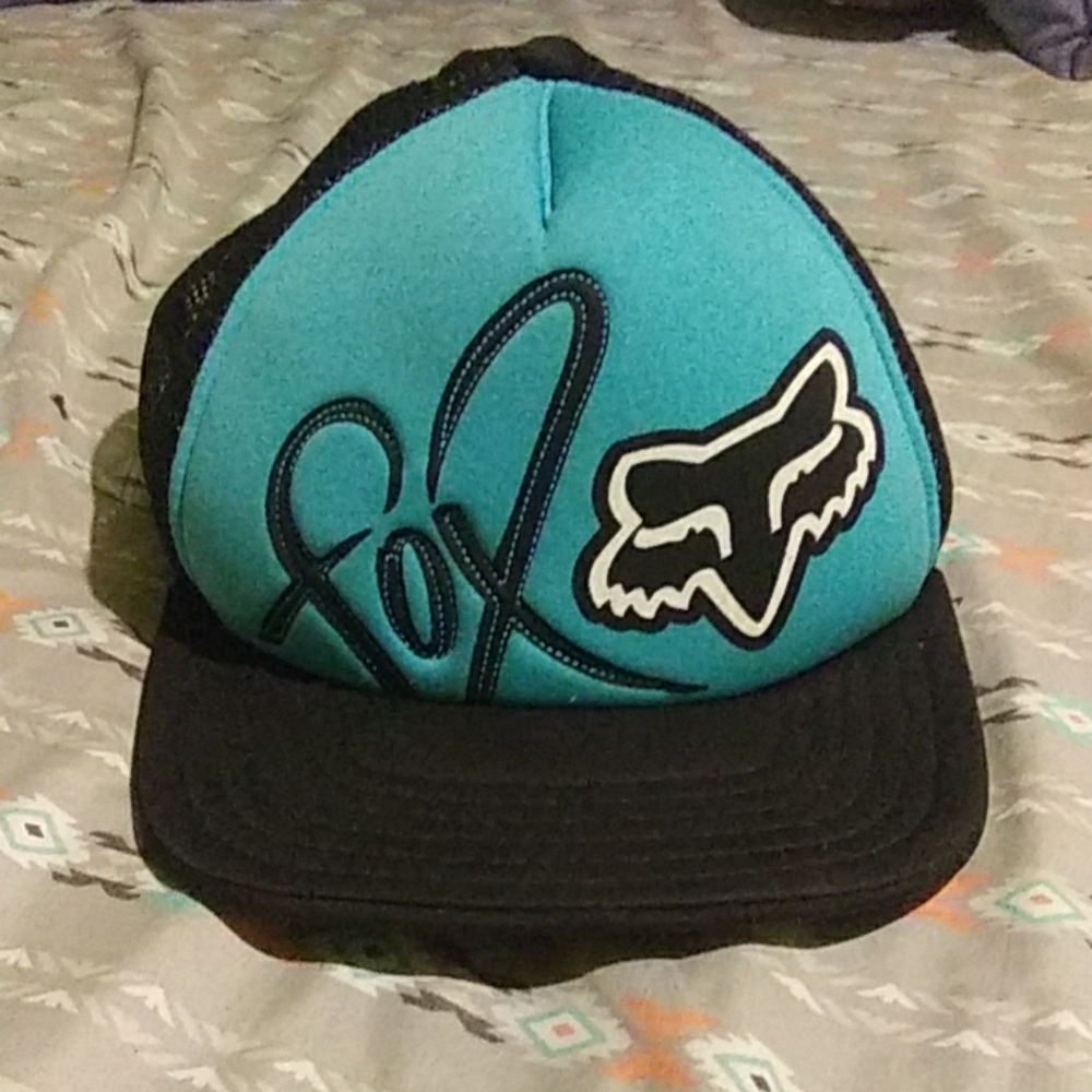 Blue and black Fox motorsports snapback hat.